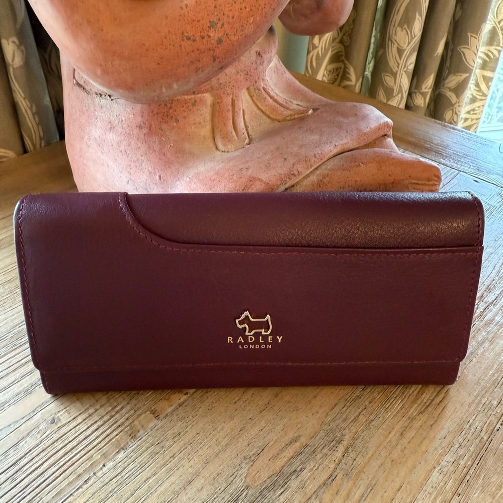 Radley London premium leather wallet! Pristine condition.Bordeaux color!
